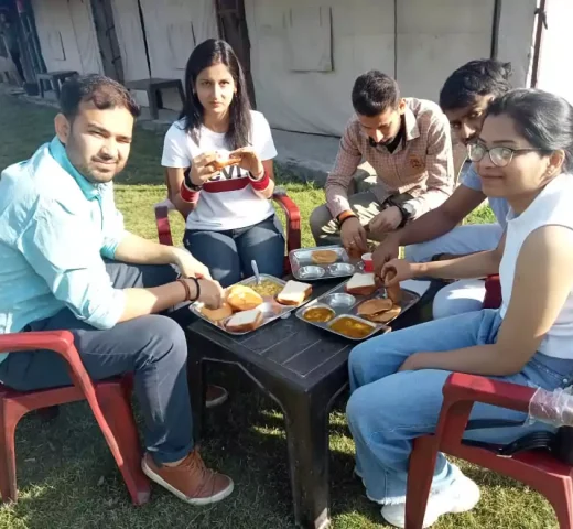 group eating food during camping